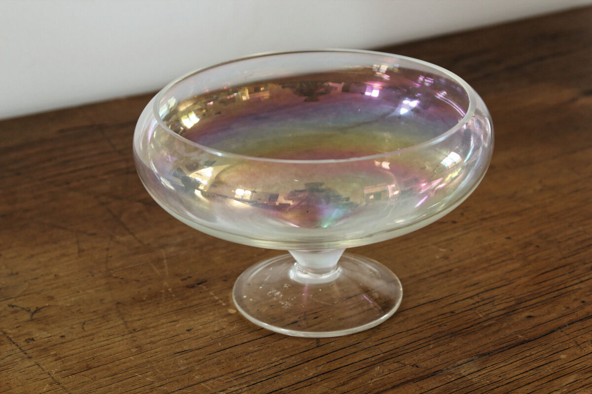Old iridescent glass cup