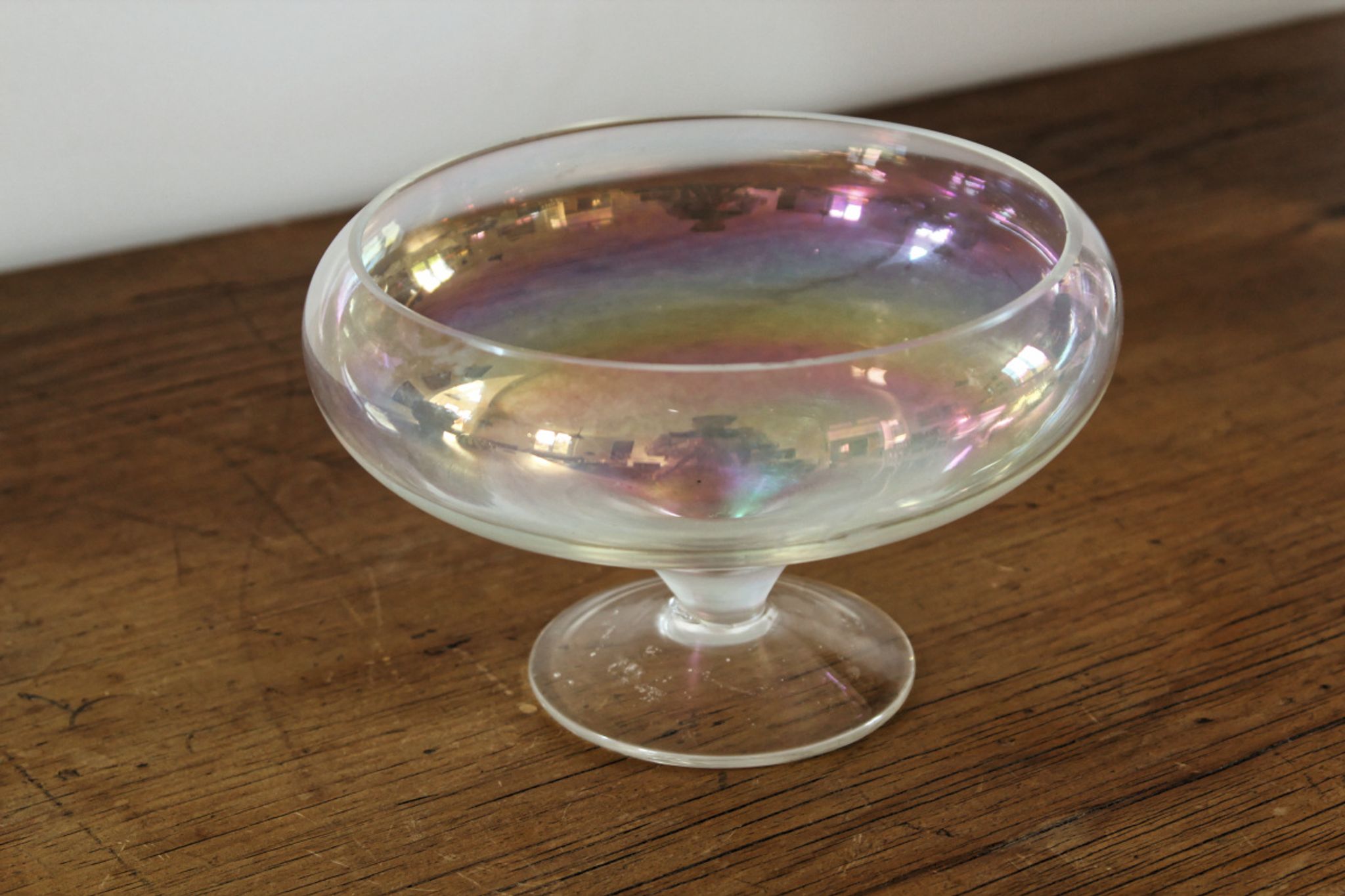 Old iridescent glass cup