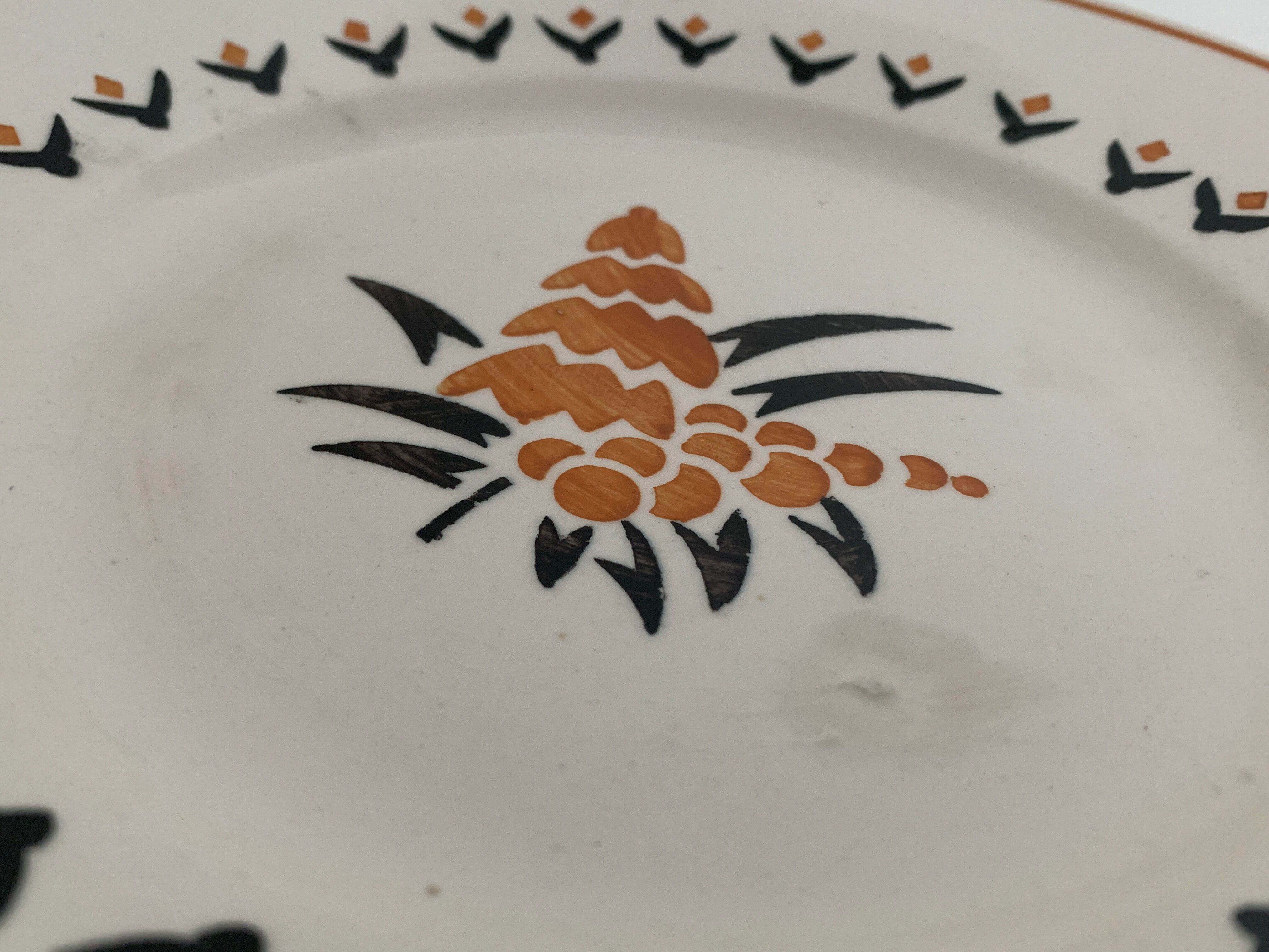 7 dessert plates and one Longwy dish