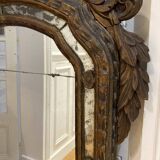 Large mirror or trumeau with beadwork in carved and gilded wood. Italian work from the beginning of the 19th century