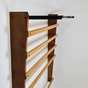 Rare coat rack by Carl Auböck with hat rack, cabinet, brass, walnut and beech, 1950s.