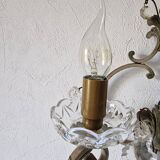 Pair of sconces in patinated metal and crystal tassels