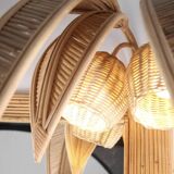 Illuminated “coconut tree” mirror in rattan