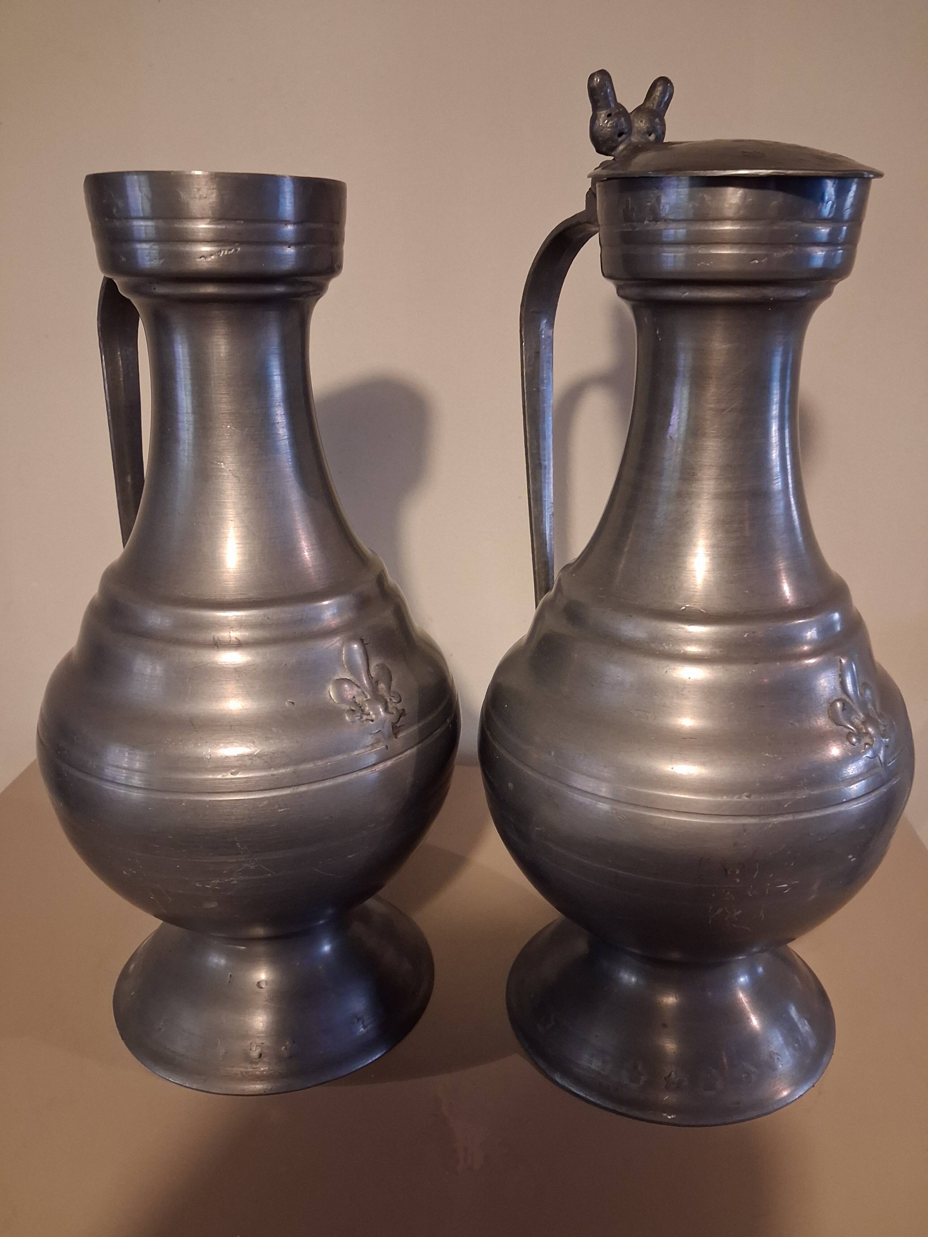 Large vintage pewter jugs