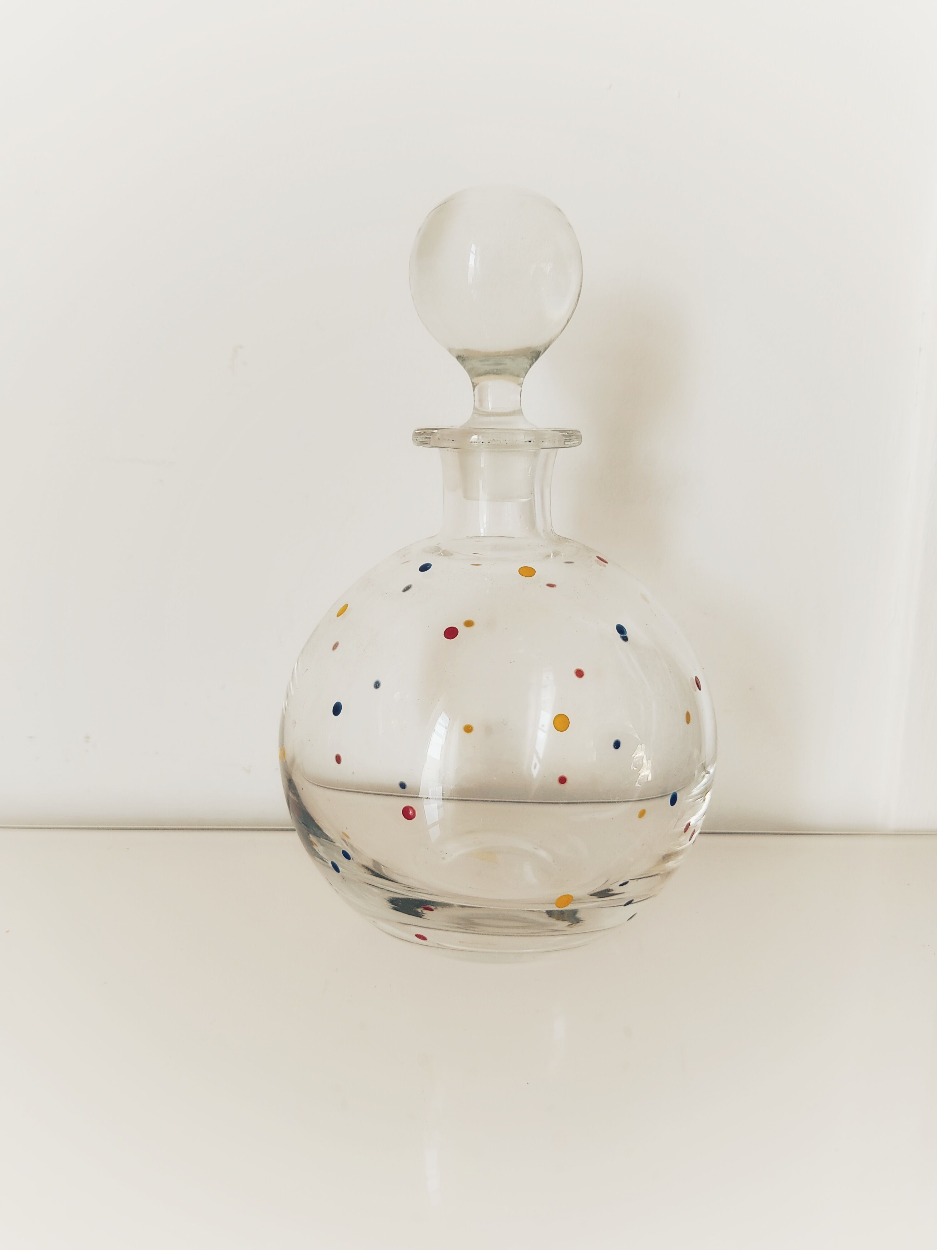 Crystal decanter with colored enamel dots