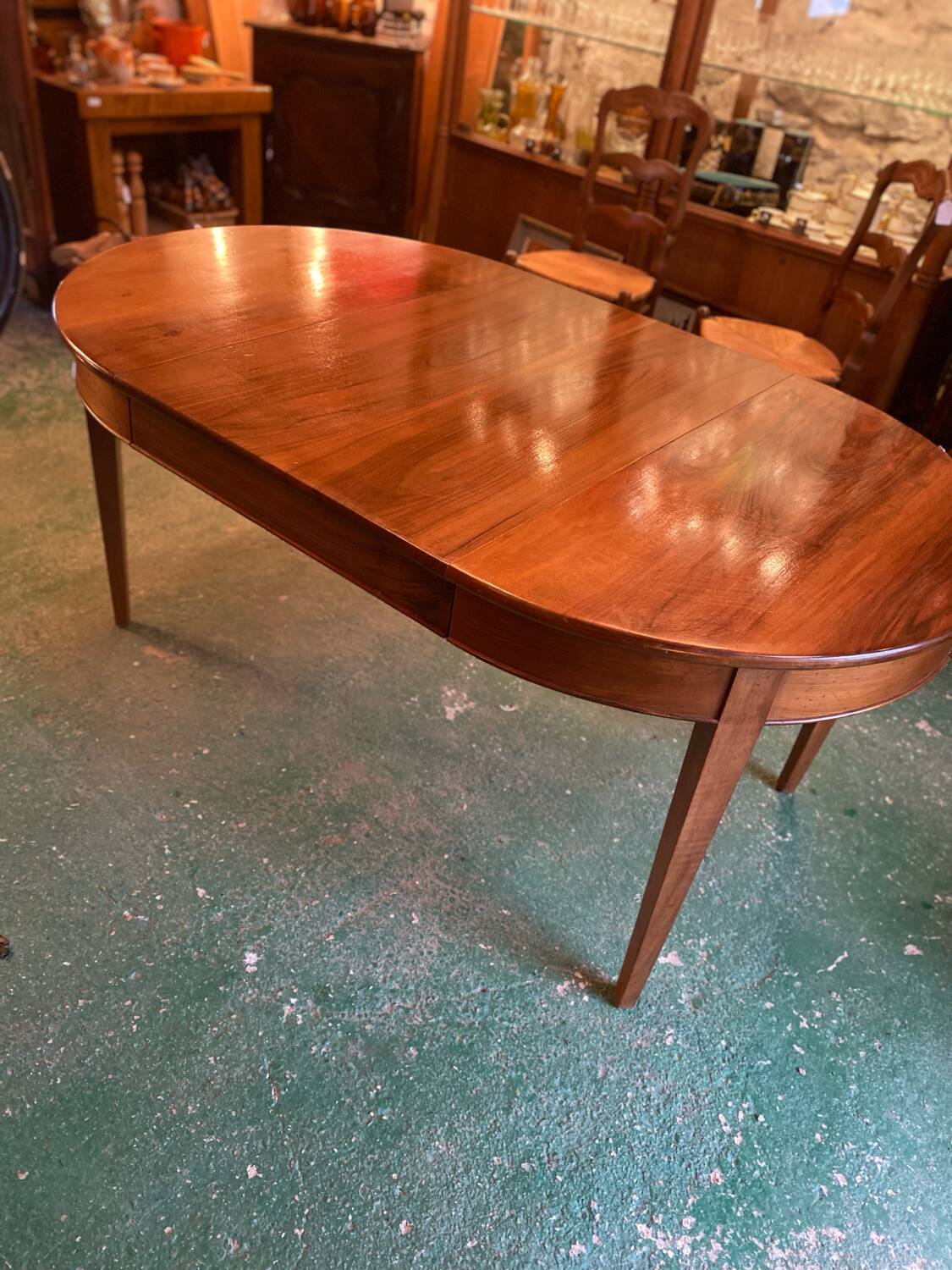 Louis XVI style oval walnut extendable table