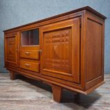 Low buffet in carved oak, Art Deco style, circa 1930.