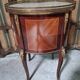 Lady's demi-lune commode in Louis XV style with marquetry and gilded bronze.