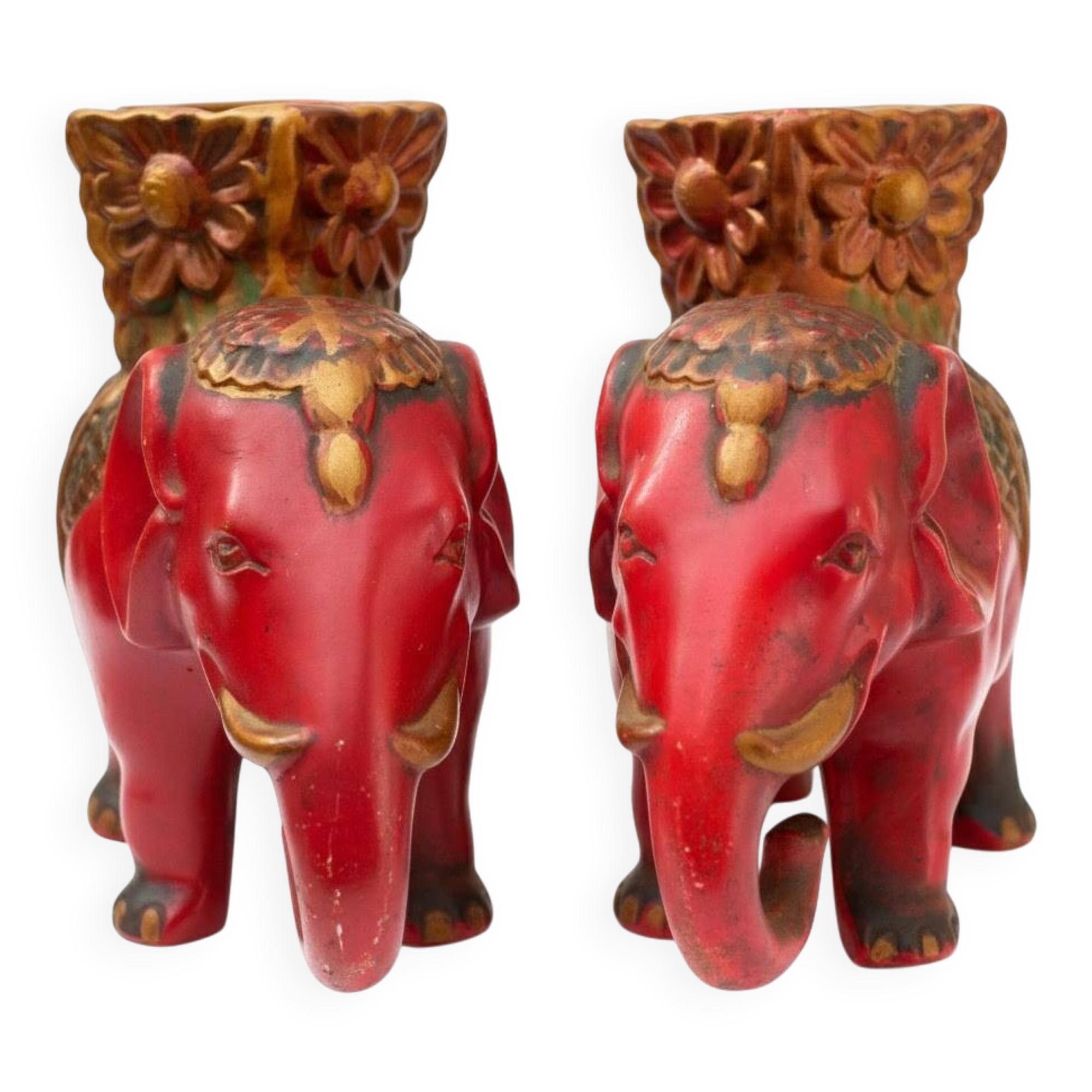 A pair of red and gold ceramic vases in the shape of elephants, 1940s.