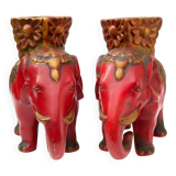 A pair of red and gold ceramic vases in the shape of elephants, 1940s.