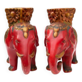 A pair of red and gold ceramic vases in the shape of elephants, 1940s.