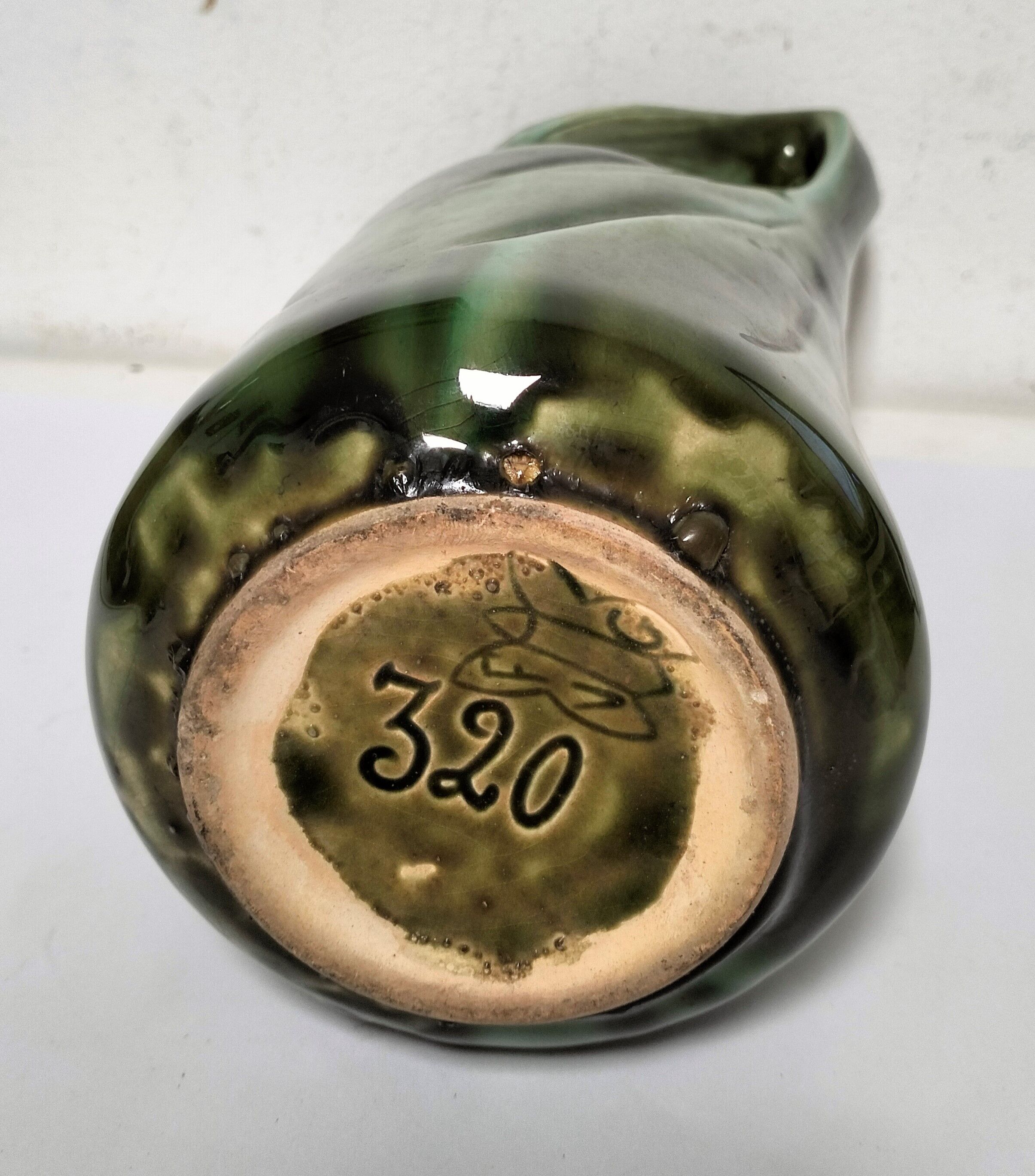 Old art nouveau earthenware slip vase