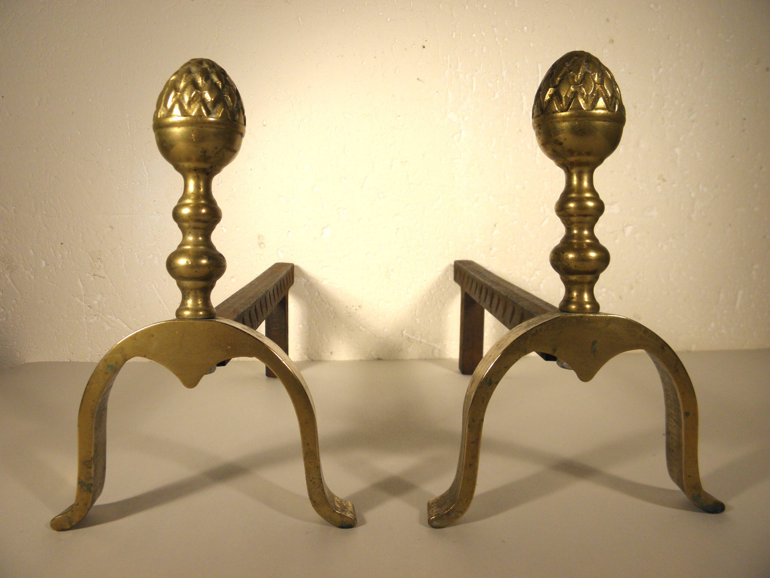 Pair of brass “pine” andirons