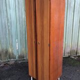 Vintage wardrobe and shelves with formica front doors and oak cp sides.