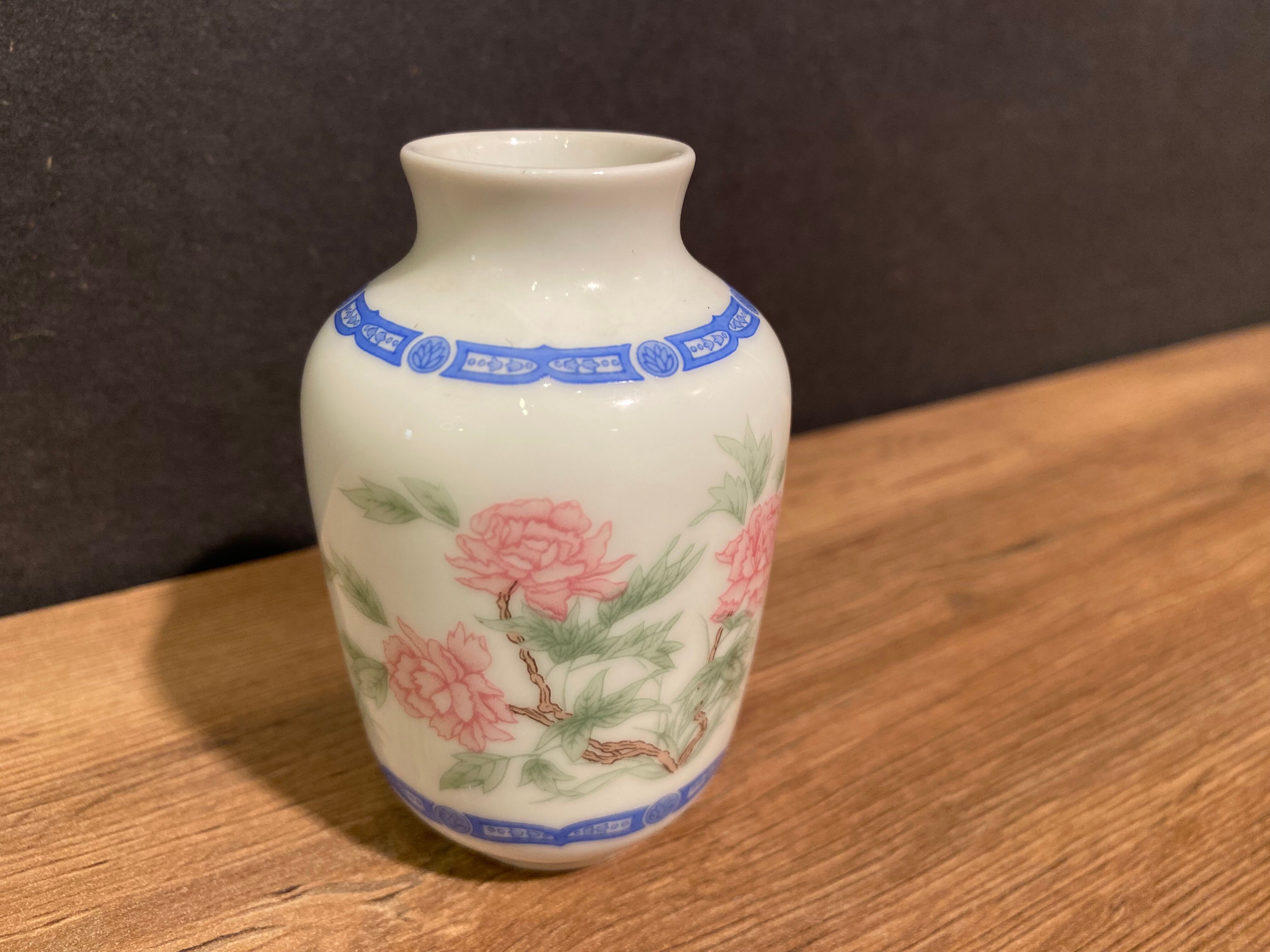 Miniature porcelain vase with floral decoration, Rose family