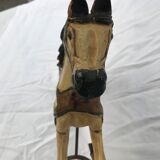 Wooden horse with period ironwork support