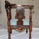 Fauteuil d'angle néo-renaissance en noyer sculpté
