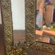 Mirror with brass repoussé frame
