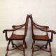 Pair of antique armchairs curules called Dagobert in carved wood