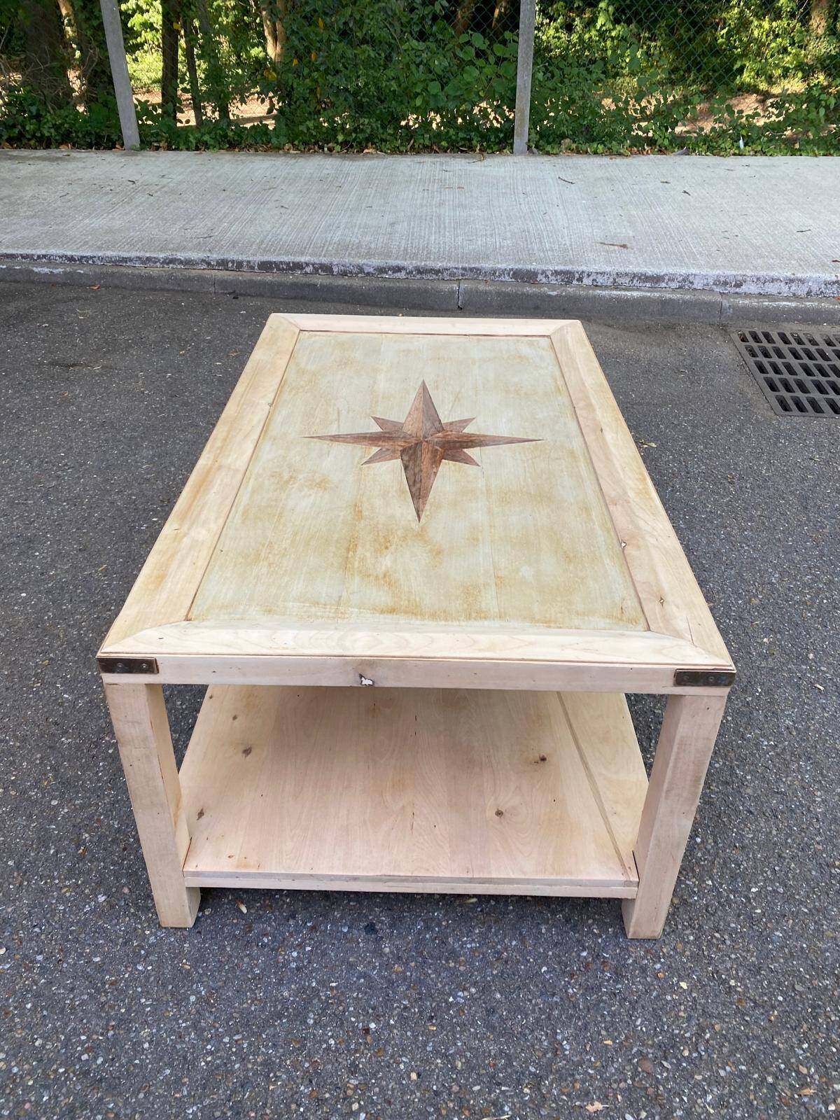 Renovated solid wood coffee table in chic country seaside style.