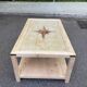 Renovated solid wood coffee table in chic country seaside style.