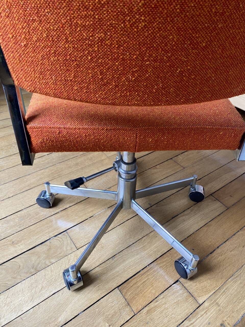 Orange office chair in 70s style