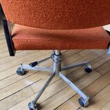 Orange office chair in 70s style