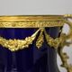 Vase signed Legastelois in blue ceramic of Sèvres and gilded bronze