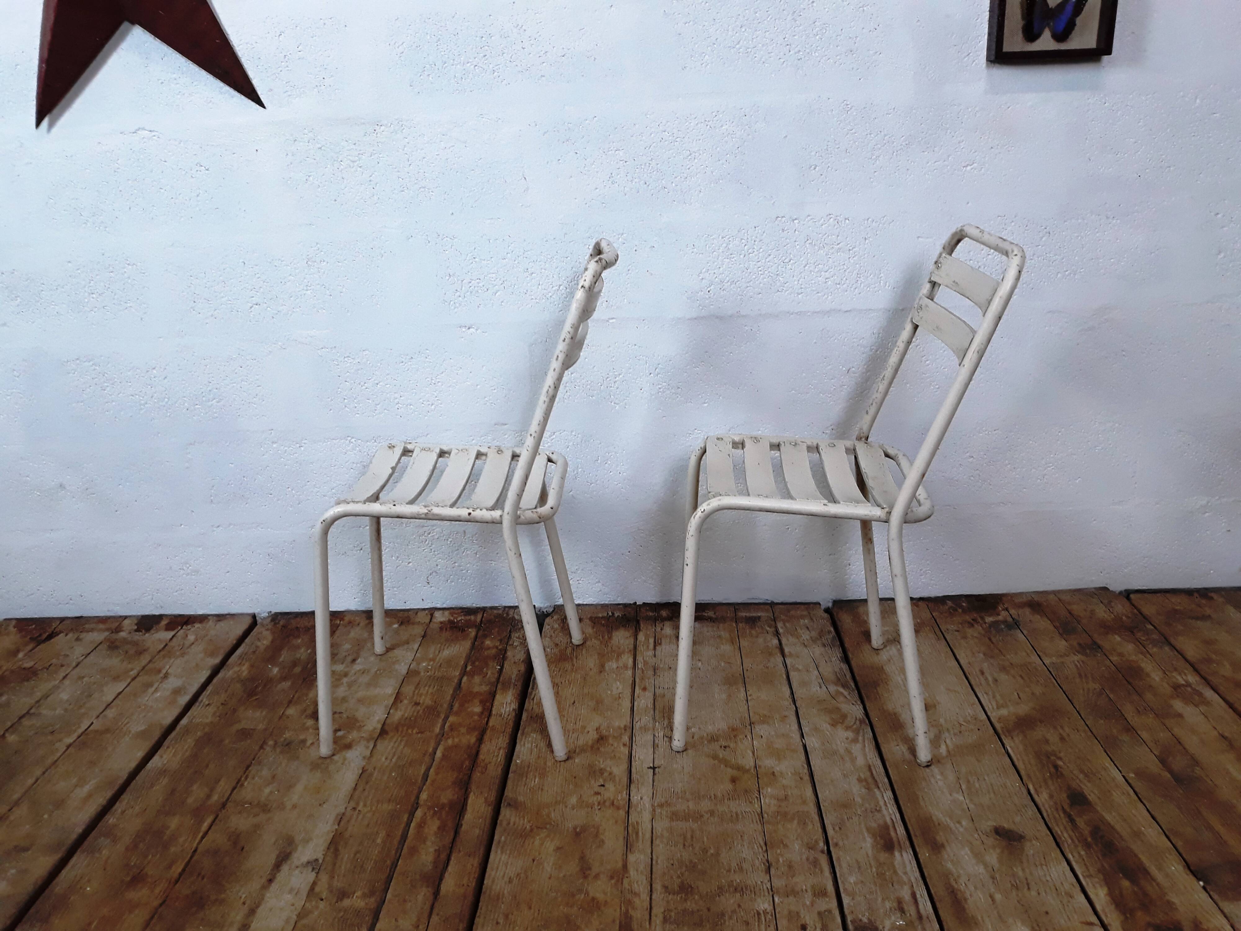 4 chairs and armchairs by Tolix