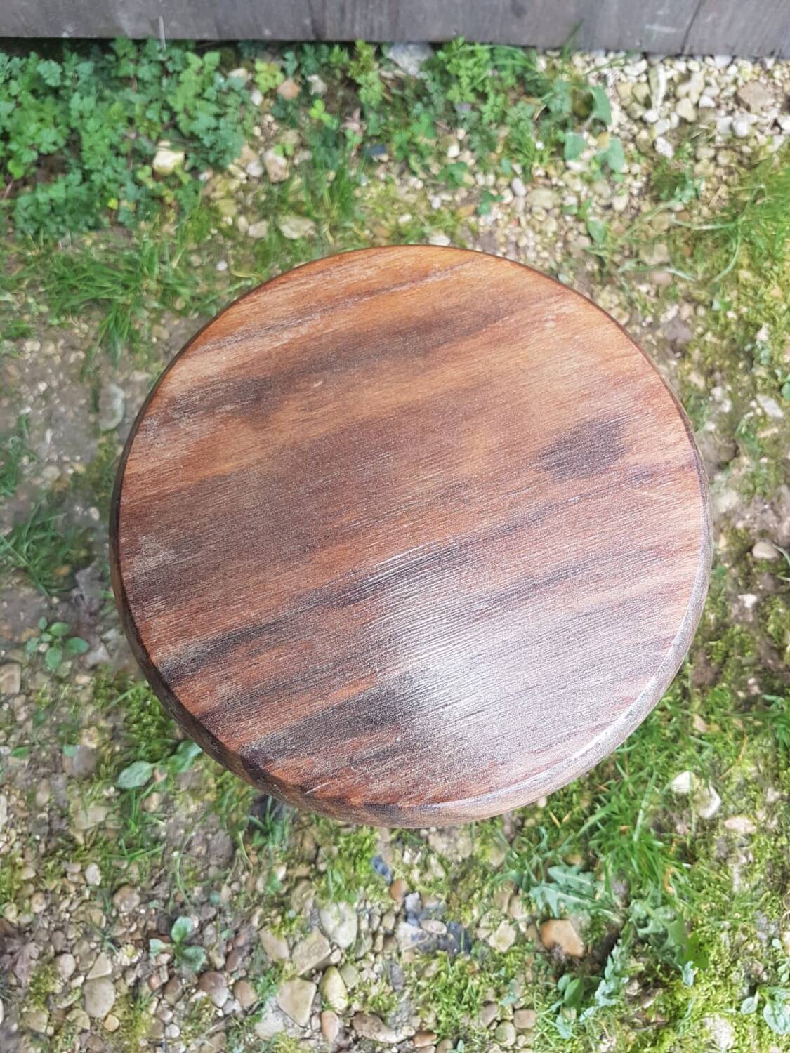 Old vintage wooden tripod milking stool