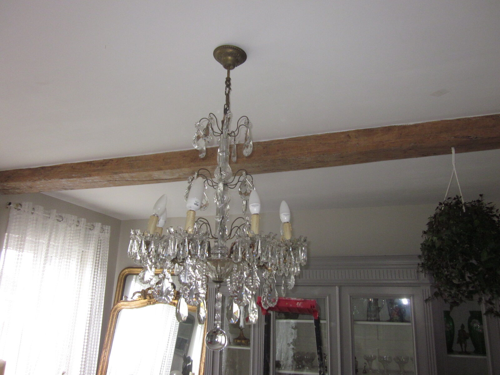 chandelier has antique pendants