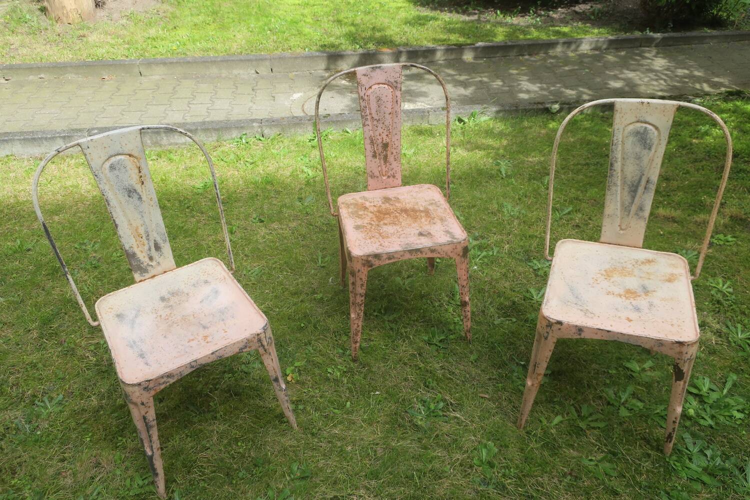 Set of 3 early 20th century patinated Tolix inspired bistro garden stacking chairs