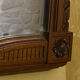 Carved wooden mirror in Louis XVI style