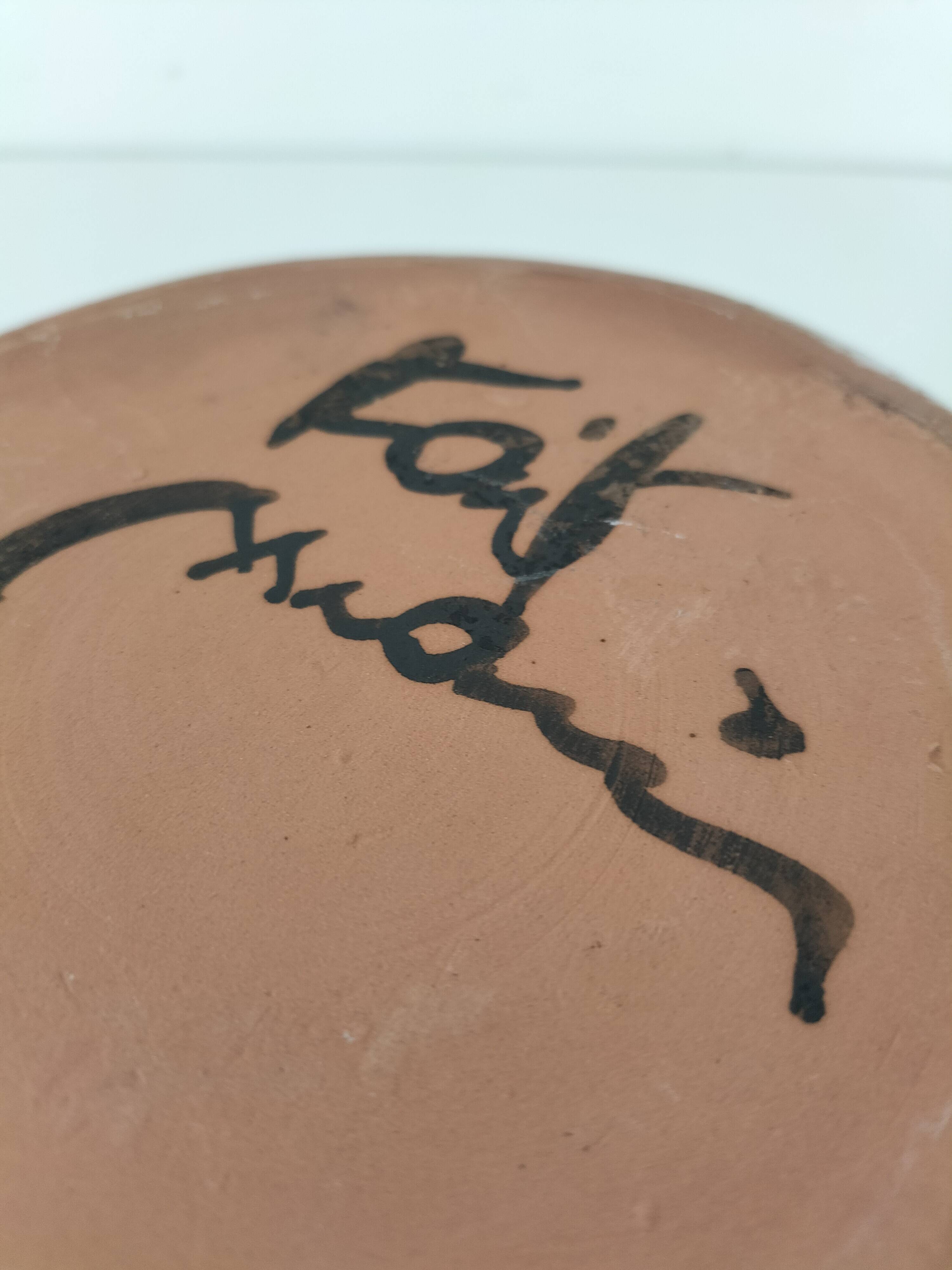 Glazed stoneware dish with floral motif