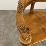 Chalet-style carved wooden tripod armchair