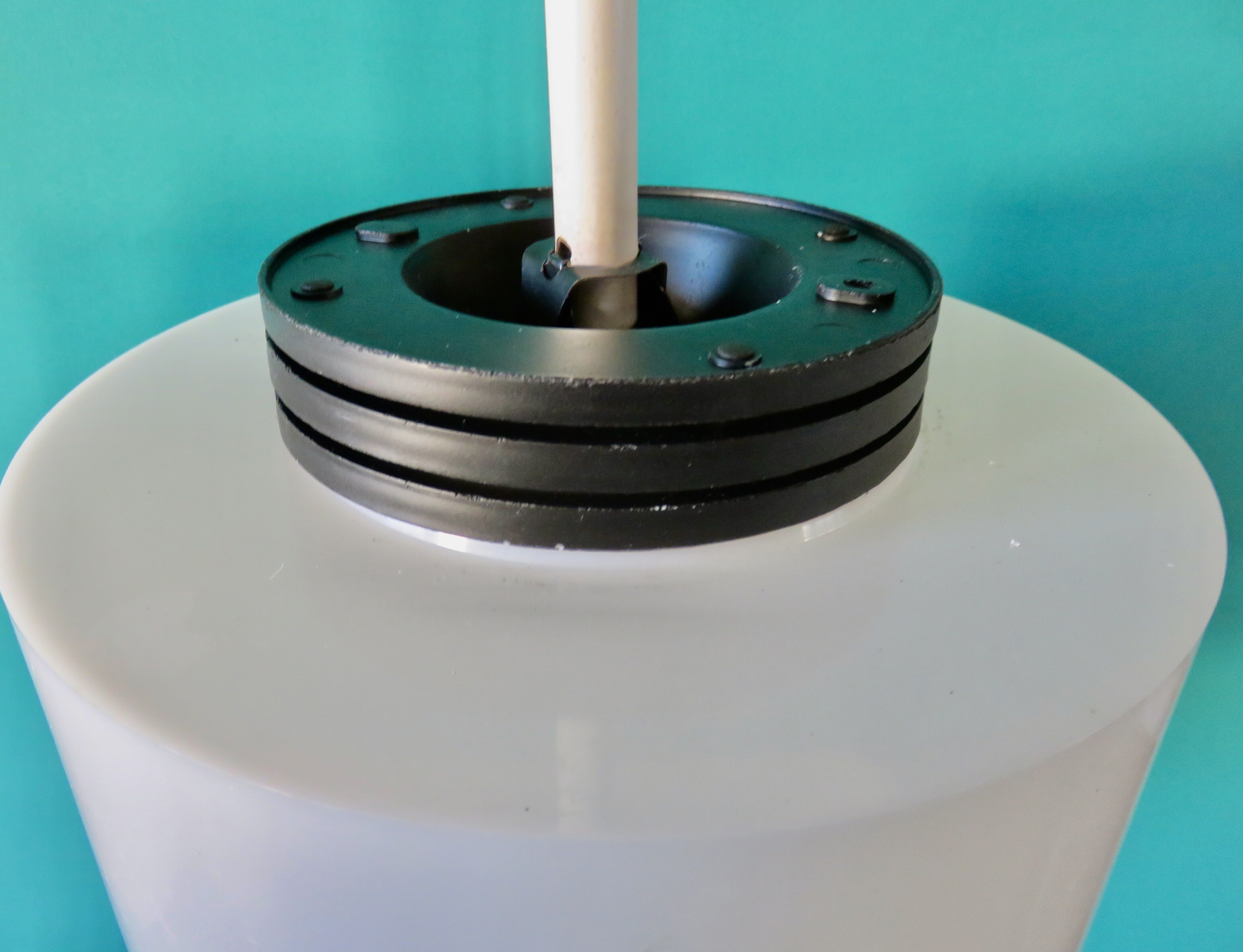 Three cylindrical suspensions in white resin, France 1970.