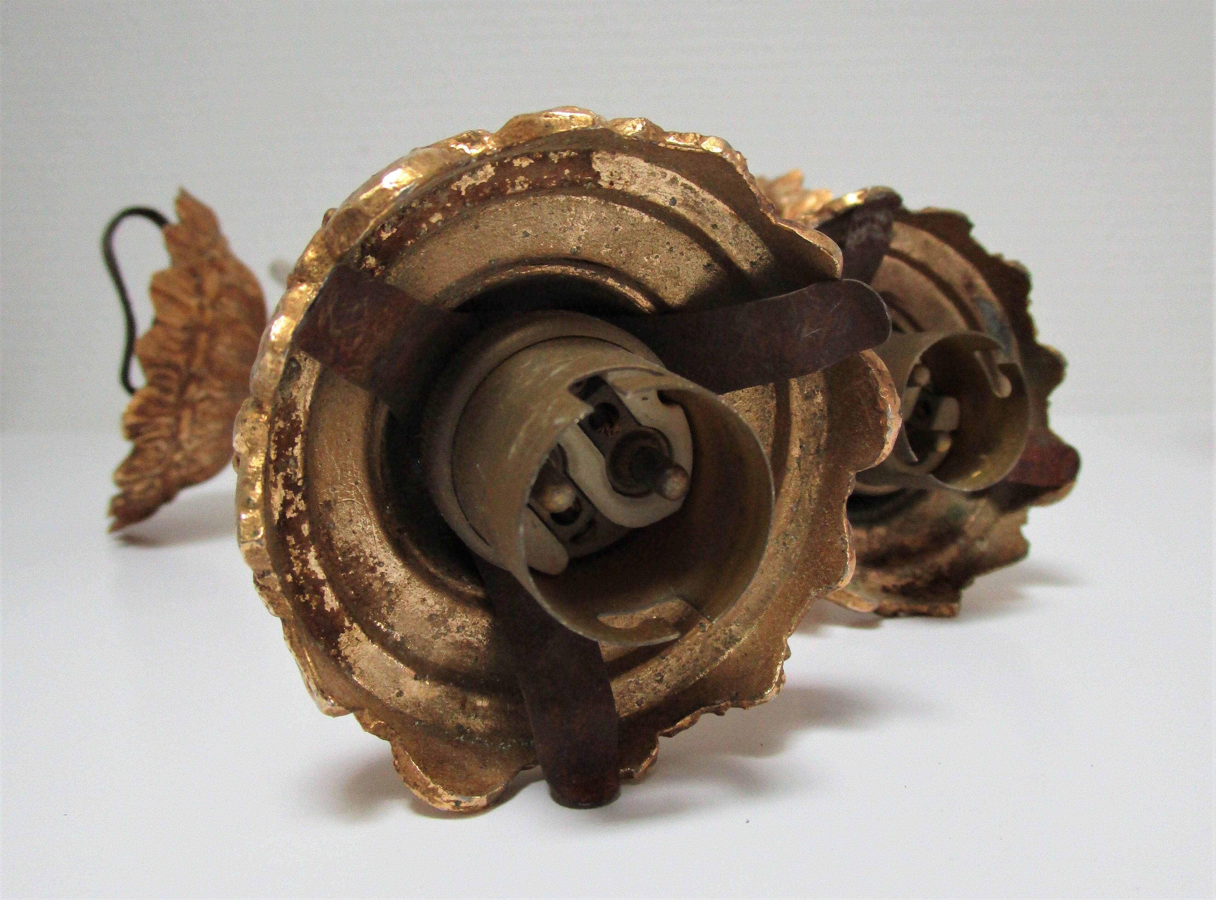 Pair of vintage patinated golden metal hand sconces