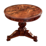 Gueridon in mahogany flame of the 19th century restoration