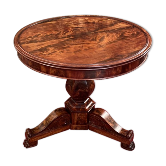 Gueridon in mahogany flame of the 19th century restoration