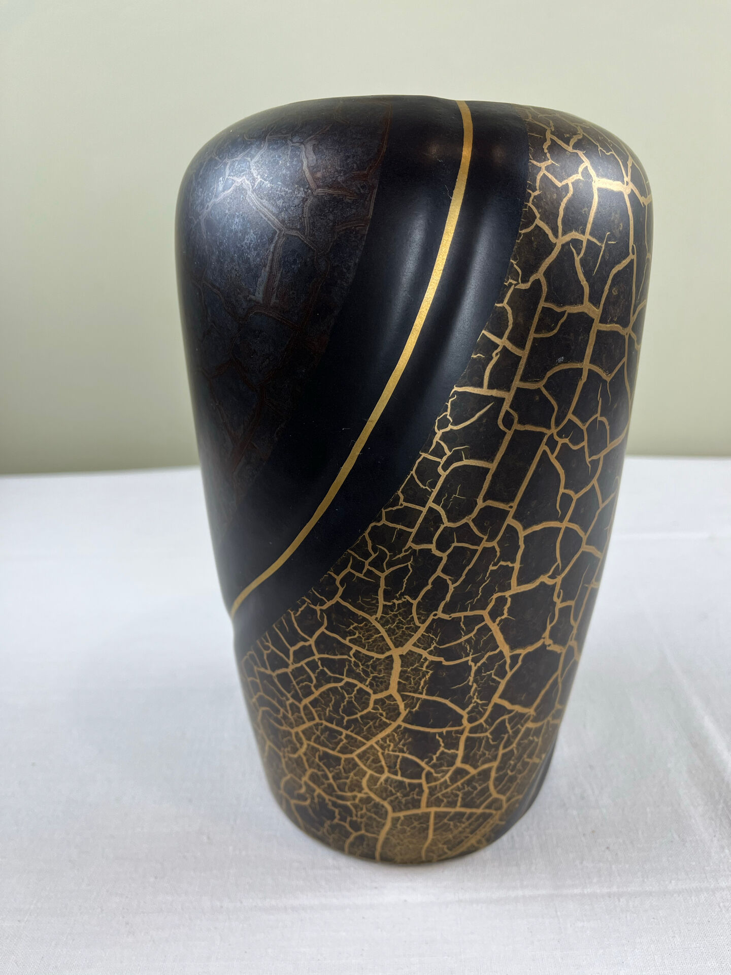 Vase with golden scales