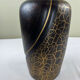 Vase with golden scales
