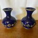 Pair of antique cobalt blue ceramic vases + vintage metal decor