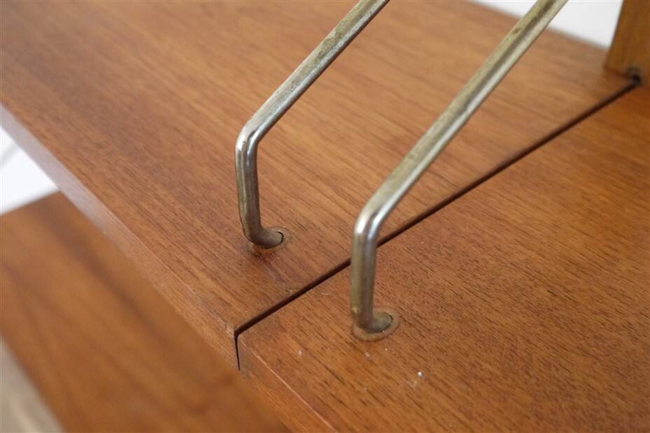 Danish wall shelving system in teak from the 1960s.