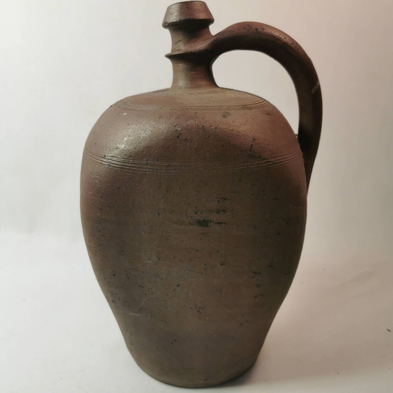 Norman jug bottle with old sandstone handle