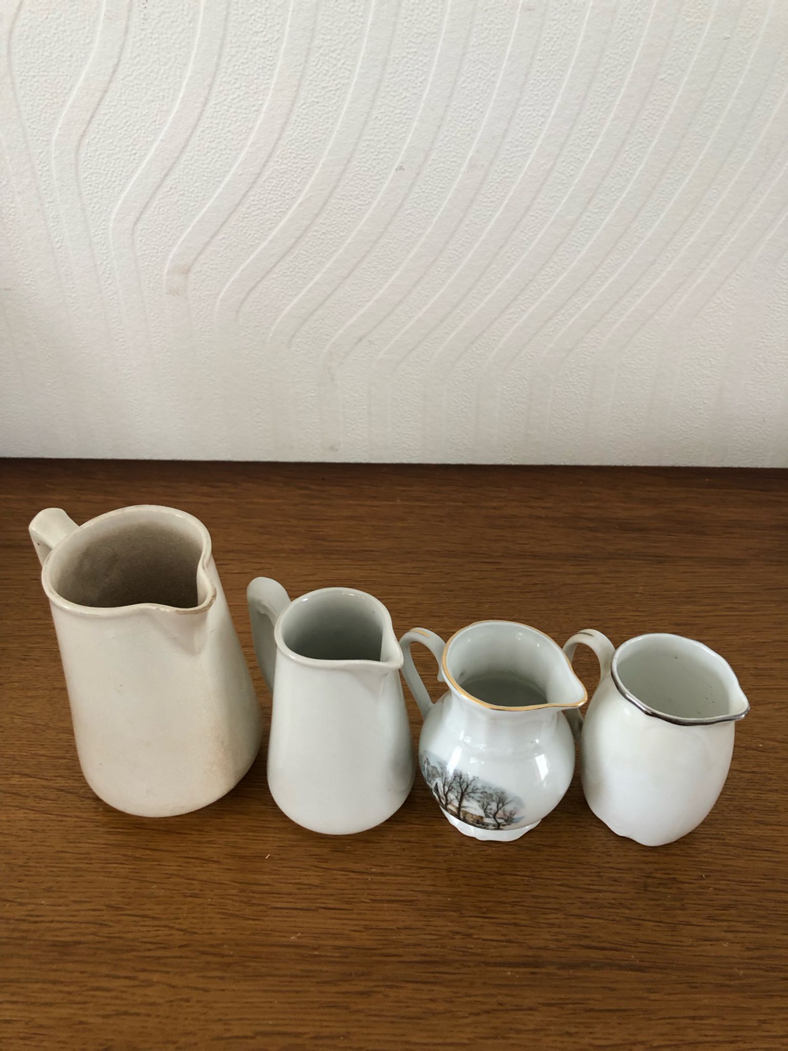 Set of 4 Vintage Porcelain Milk Jugs