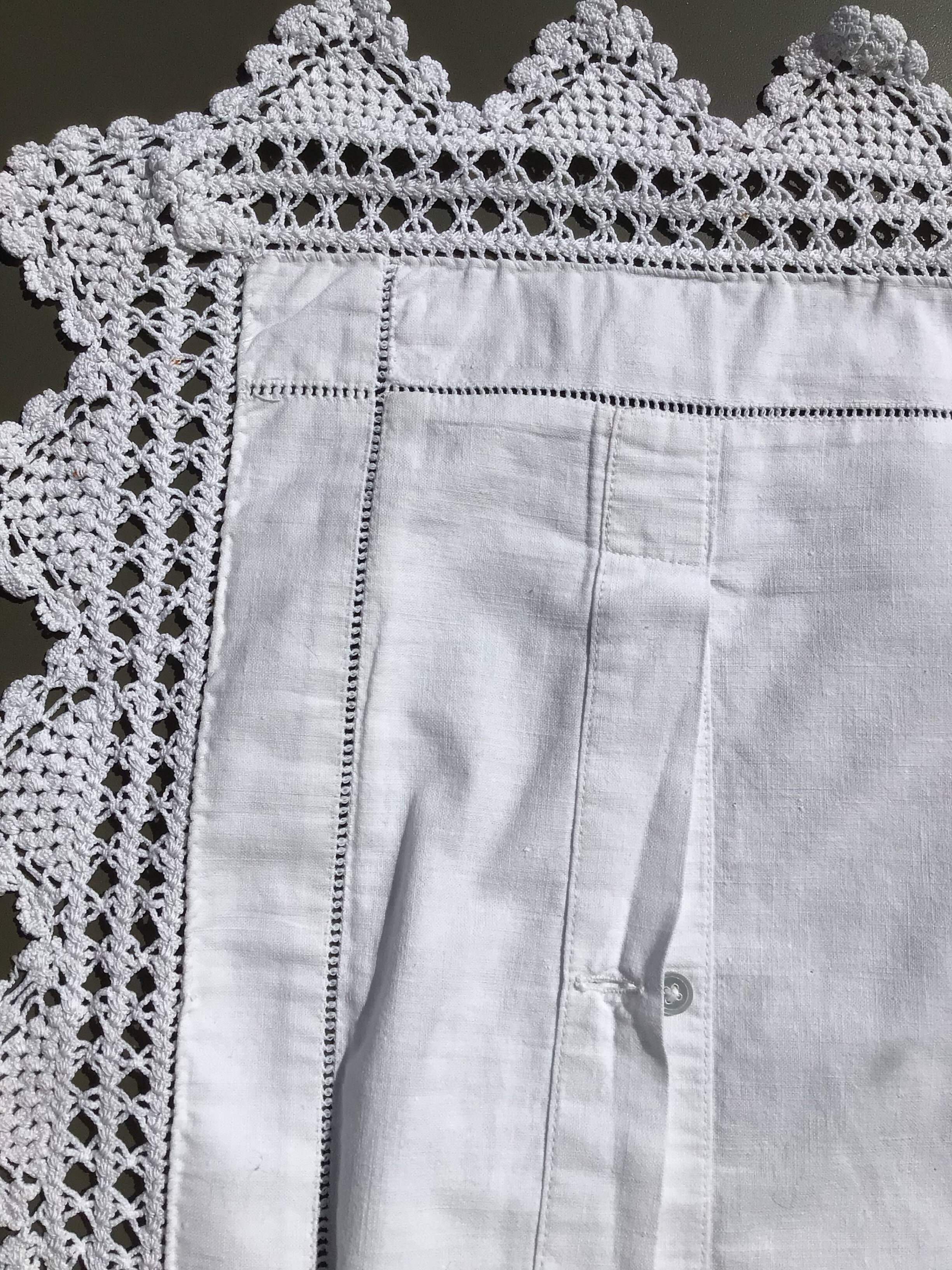 MC embroidered pillowcase with flower detailing and crocheted edge