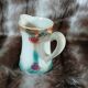 Antique slipware milk jug