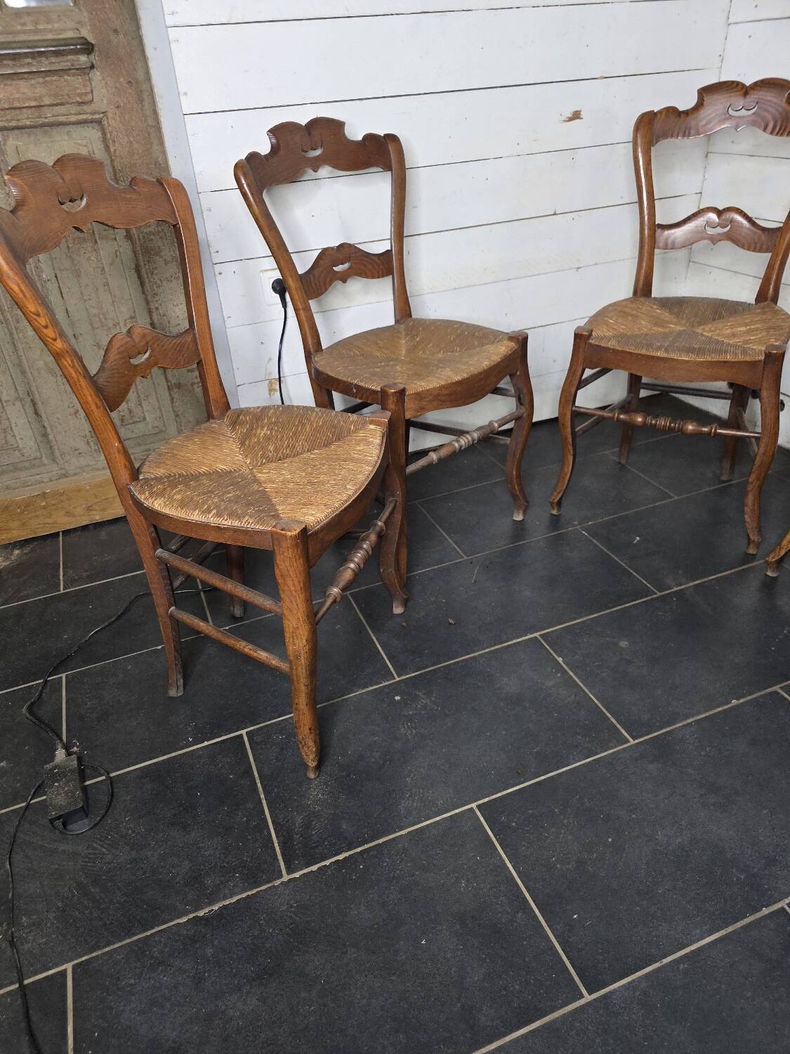 4 old straw chairs