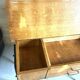 Vintage 1950s sewing machine with blonde oak veneer.