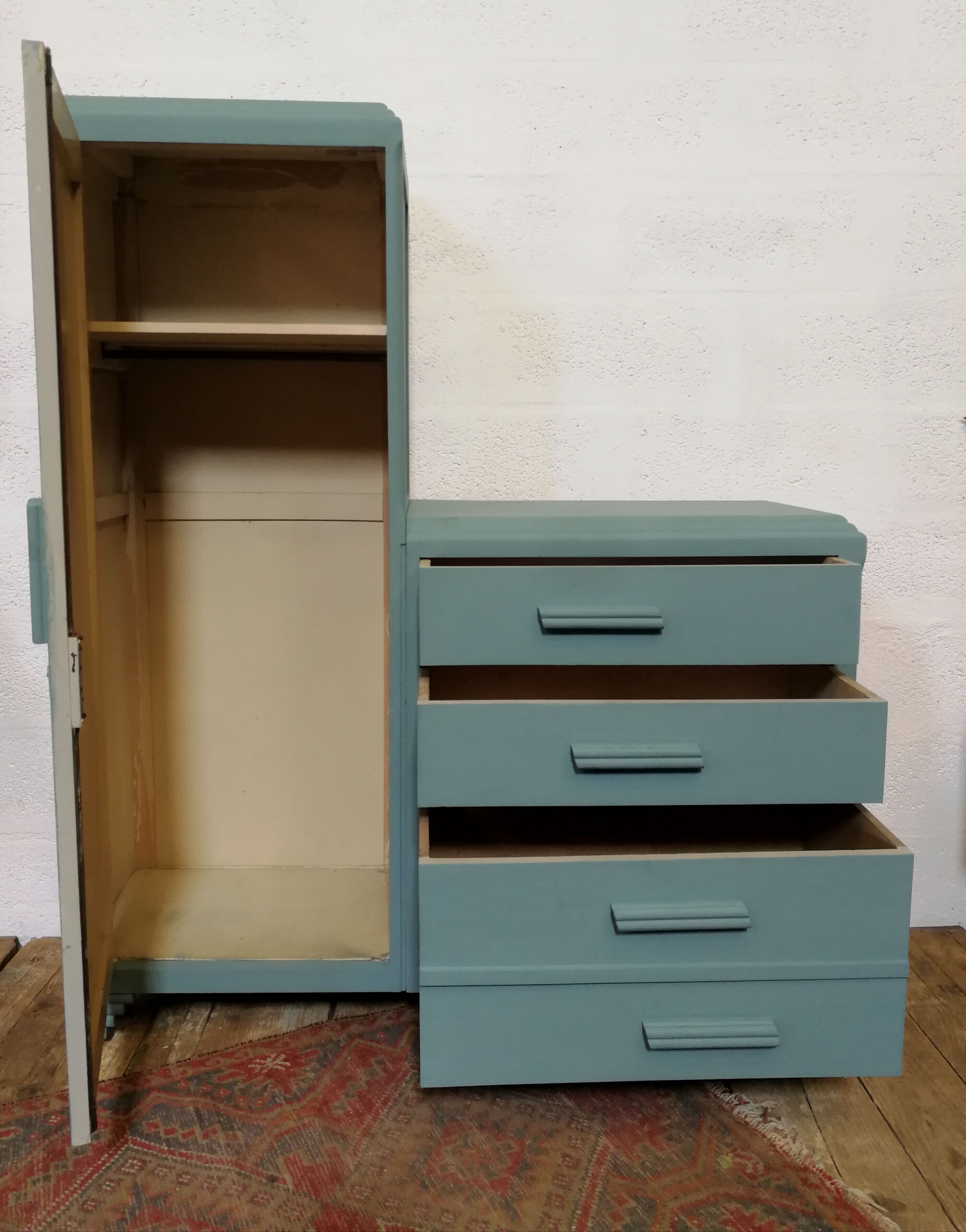 Asymmetrical furniture of the 1950s blue duck